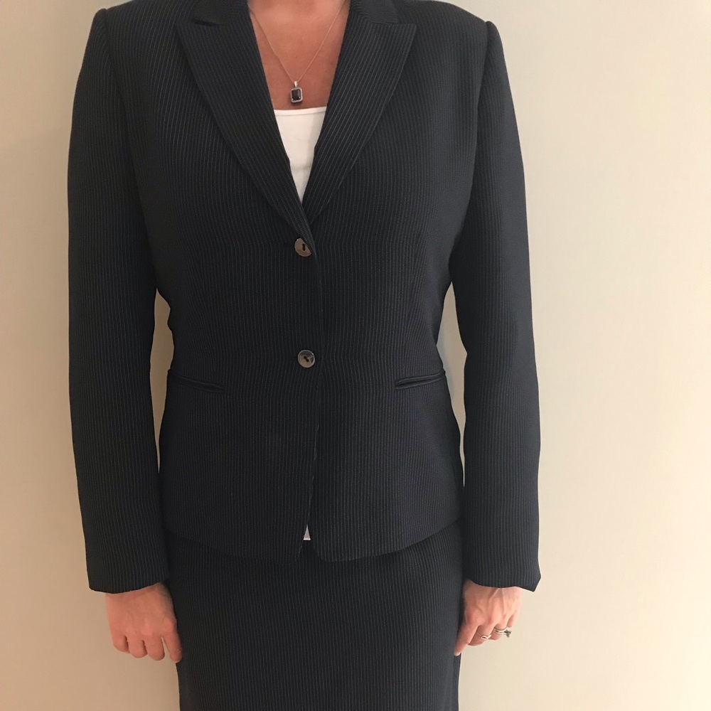 Black pinstriped skirt suit